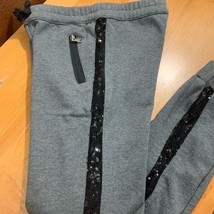 Hudson Joggers Grey with black side sequin. 
Size XL